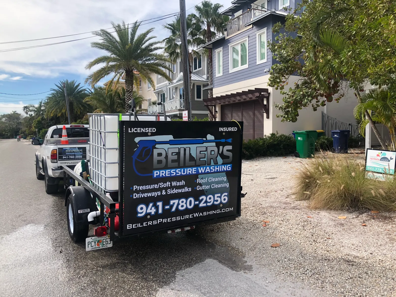 Beiler's work truck parked at a Siesta Key customer's home