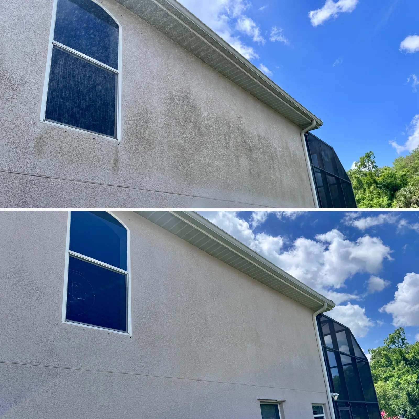 House exterior being soft washed, dirt and mildew rinsing away