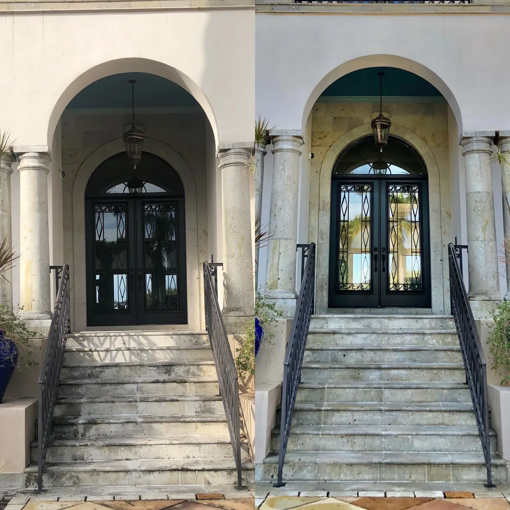 Marble front entry steps cleaned during a house wash